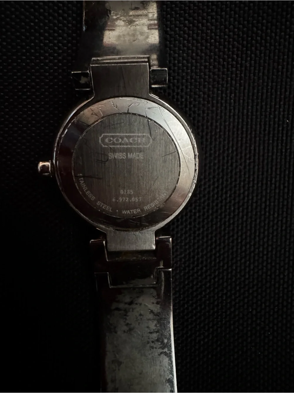 Coach polished silver